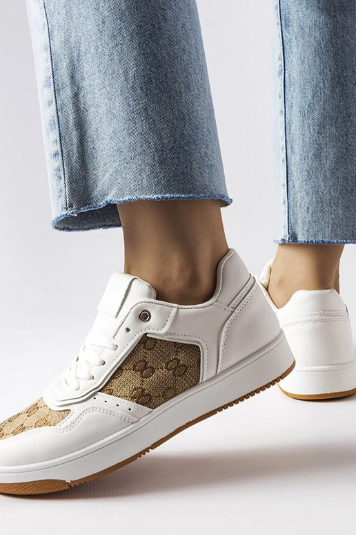 Biele tenisky zdobené Isidoriným...