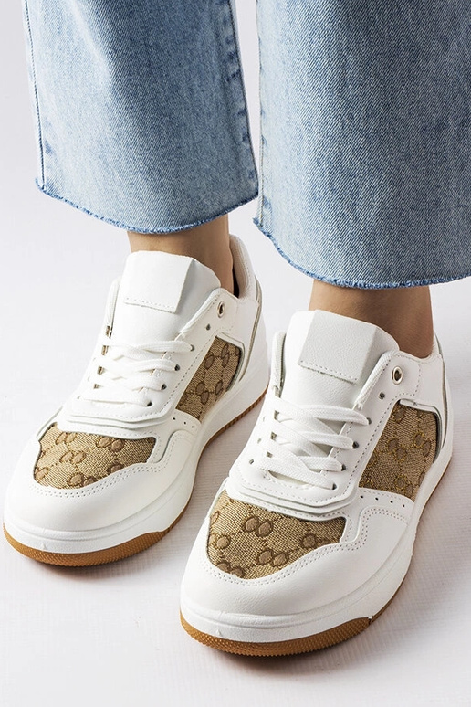 Biele tenisky zdobené Isidoriným...