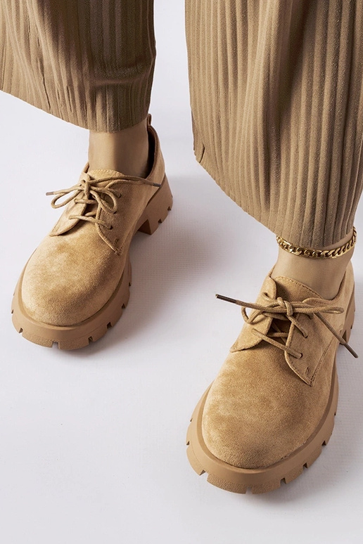 Hnedé poltopánky na masívnej...