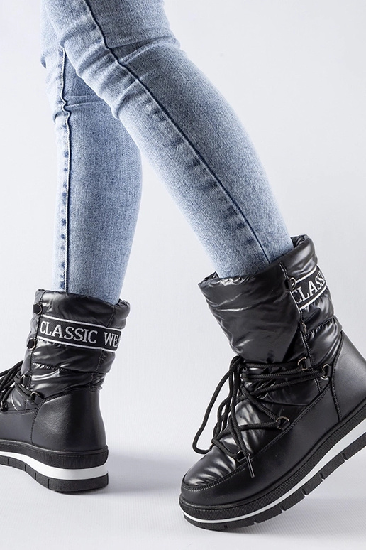 Čierne topánky do snehu na platforme...