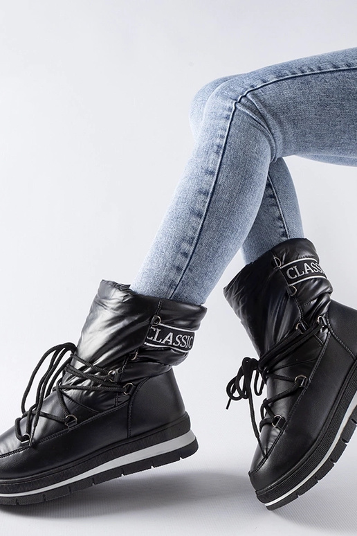 Čierne topánky do snehu na platforme...