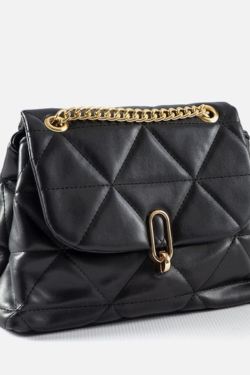 Čierna prešívaná taška cez...