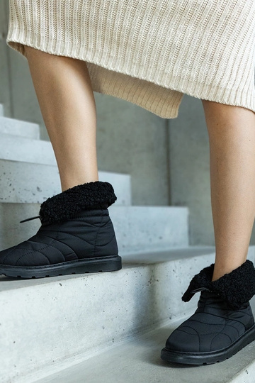 Čierne zateplené snehule...