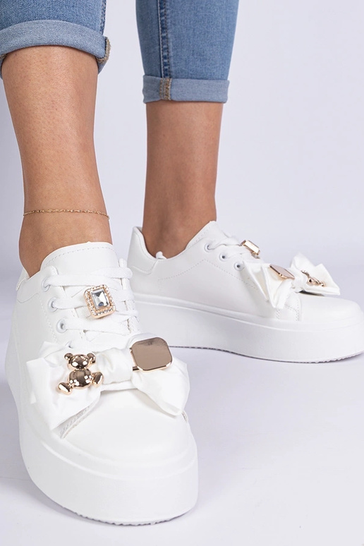 Biele dámske sneakersy zdobené...
