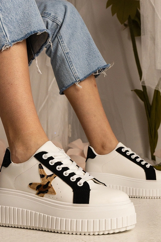 Bielo-čierne tenisky zdobené...