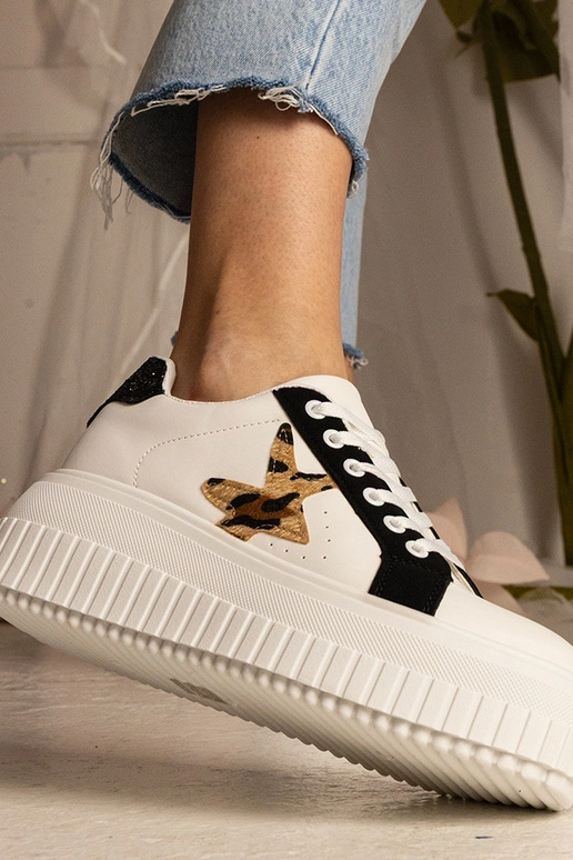 Bielo-čierne tenisky zdobené...