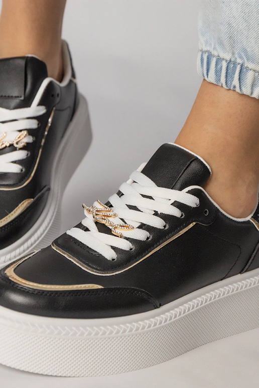 Čierne športové topánky s trblietkami...