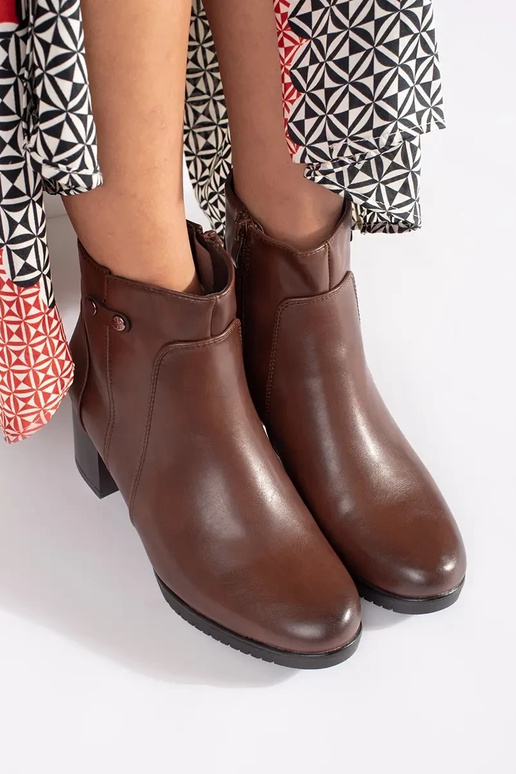 Hnedé topánky na vysokom podpätku...