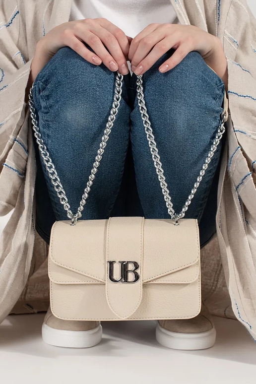 malá jasnomodrá dámska kabelka so...