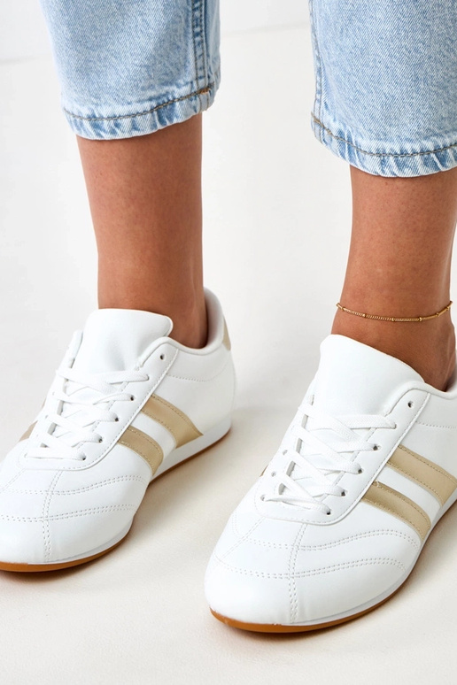 Biele tenisové typy tenisky so zlatým...