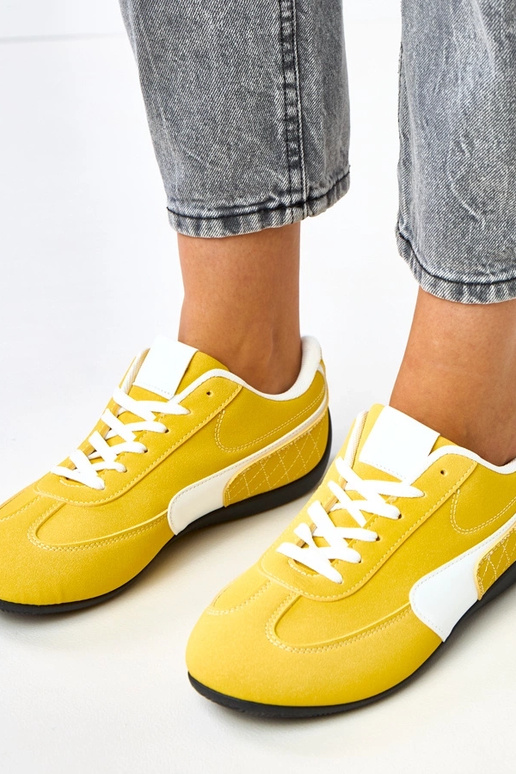 Žlté športové tenisky s bielym...