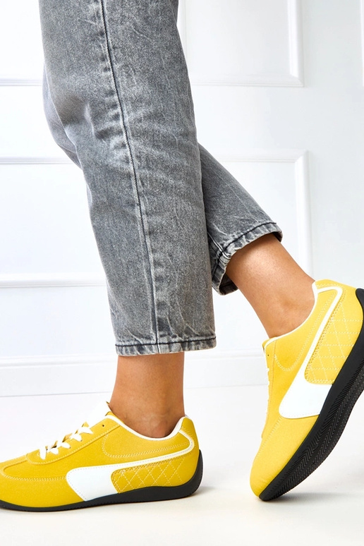 Žlté športové tenisky s bielym...