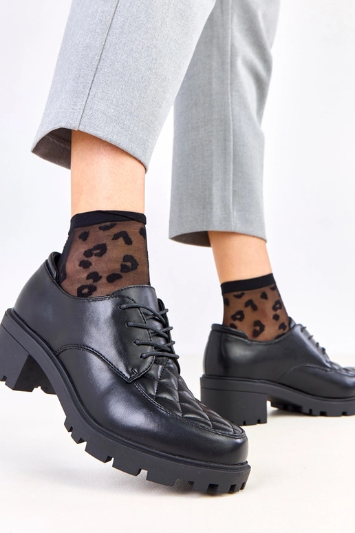 Čierne poltopánky s prešívaným...