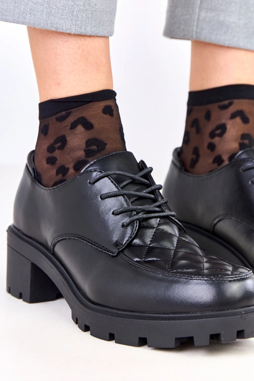 Čierne poltopánky s prešívaným...