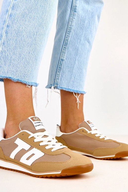 Zelené športové topánky s bielymi...