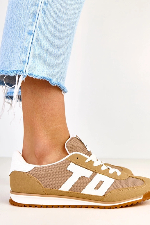 Zelené športové topánky s bielymi...