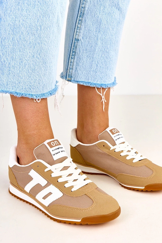 Zelené športové topánky s bielymi...