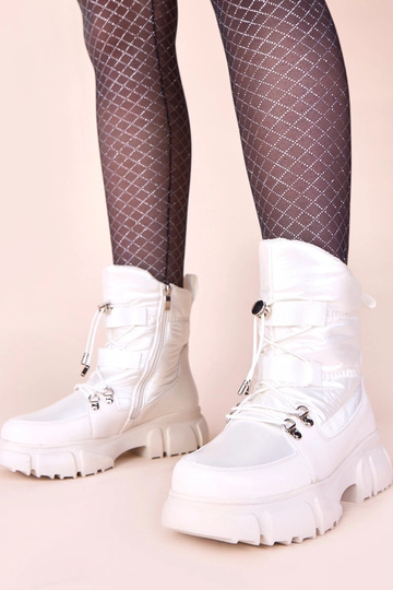 Biele snehové topánky s...