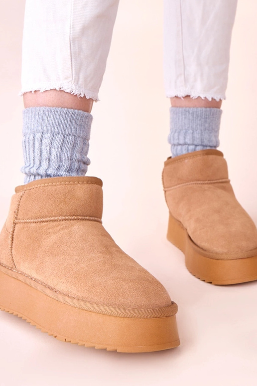 Hnedé snehové čižmy z pravej...