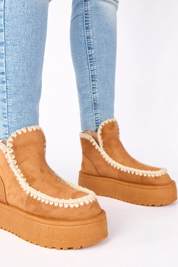 Hnedé snehové topánky na...