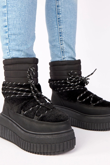 Čierne snehové topánky na...