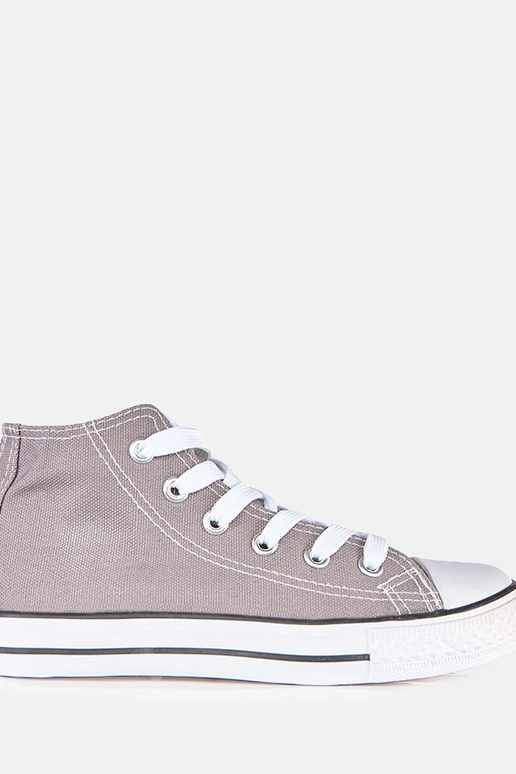 Sivé detské tenisky nad členkom Frenis