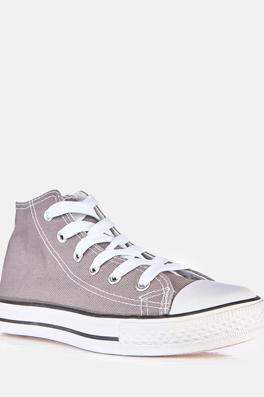 Sivé detské tenisky nad členkom Frenis