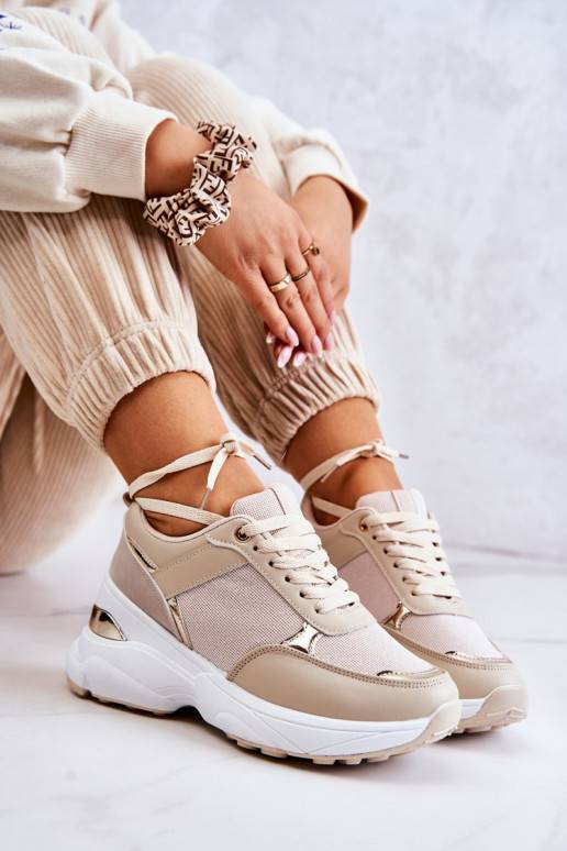 Lesklá športová obuv s béžovou... Lesklá športová obuv s béžovou...