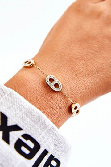 Dámsky náramok s trblietavými očkami zlatej farby 2