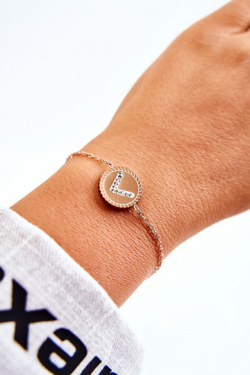 Dámsky náramok s ornamentami a zirkónovými očkami v ružovom zlate 2
