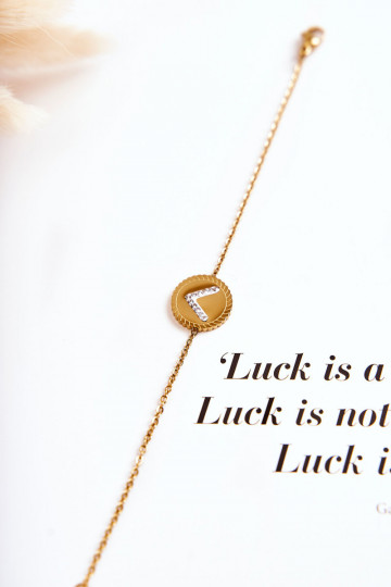 Dámsky náramok s ornamentami a zirkónovými očkami v zlatej farbe