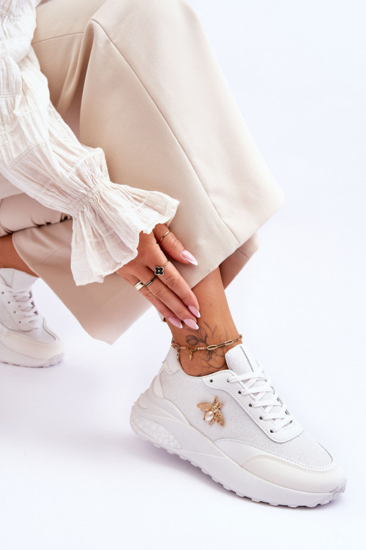 Lesklá športová obuv s ornamentami v bielej farbe Seneca